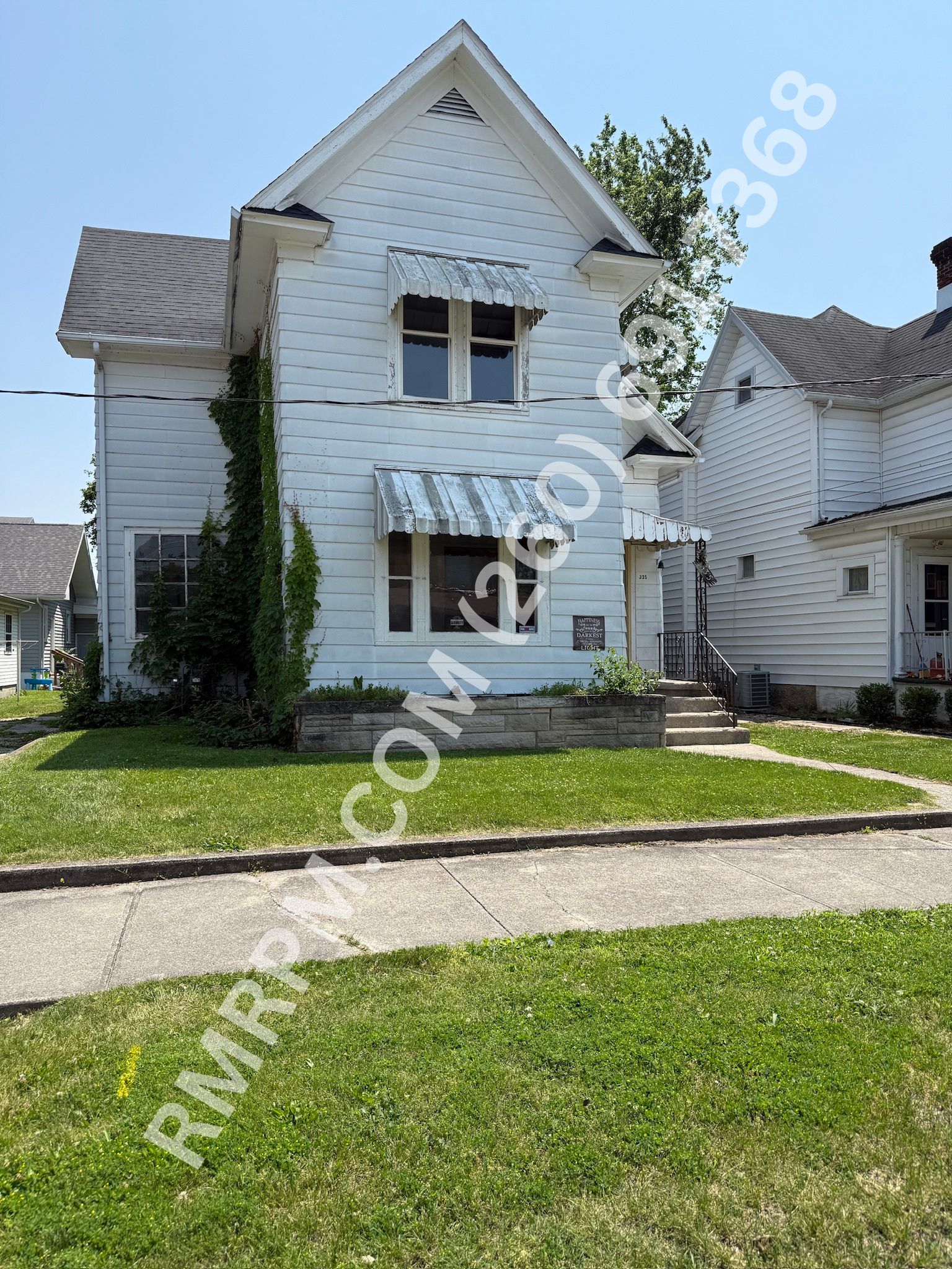 335 E Washington St. #1